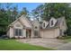 Charming home showcasing stone and siding, a two-car garage, and a well-manicured lawn at 40 Templeton Ln, Villa Rica, GA 30180