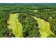 Beautiful community golf course winds through the neighborhood, surrounded by trees at 40 Templeton Ln, Villa Rica, GA 30180