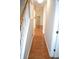 Hallway with hardwood floors leading to other rooms in the house at 40 Templeton Ln, Villa Rica, GA 30180