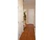 Hallway leading to staircase and other rooms in the house with hardwood floors at 40 Templeton Ln, Villa Rica, GA 30180