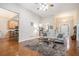 Spacious living room with hardwood floors, fireplace, and an open concept design at 40 Templeton Ln, Villa Rica, GA 30180