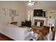 Comfortable living room featuring a stone fireplace and vaulted ceilings at 40 Templeton Ln, Villa Rica, GA 30180