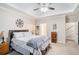 Spacious main bedroom with a tray ceiling, neutral colors, and natural light at 40 Templeton Ln, Villa Rica, GA 30180
