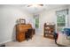 Functional home office with a roll top desk, natural light, and ample storage space at 40 Templeton Ln, Villa Rica, GA 30180