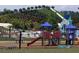 Community playground is near to the pool, and includes slides, swings, and climbing structures at 40 Templeton Ln, Villa Rica, GA 30180