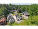 An aerial view of charming homes nestled among lush trees at 2015 Cascade Sw Rd, Atlanta, GA 30311