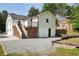 Charming home with a two-story deck and well-maintained landscaping at 2015 Cascade Sw Rd, Atlanta, GA 30311