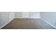 Bedroom with neutral walls and carpeted floors, offering a blank canvas for personalization and comfort at 3777 Oakland Spring Ct, Snellville, GA 30039