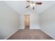 Bedroom with vaulted ceiling, carpet, neutral walls and fan at 3777 Oakland Spring Ct, Snellville, GA 30039