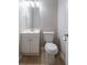 A functional half bathroom with a vanity and white fixtures at 3777 Oakland Spring Ct, Snellville, GA 30039