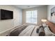 Tastefully furnished bedroom featuring modern decor, a window, and comfortable bed at 3856 Vine Stone Dr, Lithonia, GA 30038