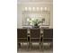 Elegant dining room featuring a modern chandelier and mirror reflecting the spacious room at 5250 Briarstone Ridge Way, Alpharetta, GA 30022