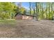 Brick ranch-style home is set amongst lush trees on a spacious lot at 622 Saddlewood Dr, Lawrenceville, GA 30043