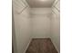Walk-in closet with carpet flooring and wire shelving for maximum organization at 815 Alta Ct, Lithonia, GA 30058