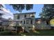 Back exterior view of home with a deck and stairs to the backyard at 815 Alta Ct, Lithonia, GA 30058