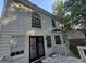 Back of house with a deck and french doors at 815 Alta Ct, Lithonia, GA 30058