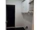 Functional laundry room with storage and a door to the outside at 815 Alta Ct, Lithonia, GA 30058