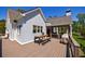 Expansive deck showcasing the home's exterior, complete with dining and grilling setup, with outdoor access at 1200 Old Lathemtown Rd, Canton, GA 30115