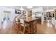 Open kitchen with an island, stainless steel refrigerator, and a view to other living areas at 1200 Old Lathemtown Rd, Canton, GA 30115