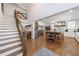 Open-concept kitchen with a large island, stainless steel appliances, and hardwood floors at 1200 Old Lathemtown Rd, Canton, GA 30115