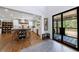 Gourmet kitchen featuring a large island, white cabinetry, and a view of the backyard at 1200 Old Lathemtown Rd, Canton, GA 30115