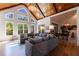 Bright living room with cathedral ceilings, large windows, wood floors, and stylish decor at 1200 Old Lathemtown Rd, Canton, GA 30115