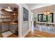 View of the pantry with open shelving, butcher block countertops, and farmhouse decor at 1200 Old Lathemtown Rd, Canton, GA 30115
