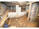 View of the crawl space with brick supports, exposed pipes, and unfinished ground at 3043 Alston Dr, Decatur, GA 30032