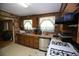 Kitchen with light countertops, stainless steel sink, and white appliances at 3043 Alston Dr, Decatur, GA 30032
