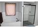 Clean bathroom with tub and glass-enclosed shower, creating a spa-like atmosphere at 3152 Spruce Way, Atlanta, GA 30349