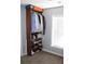 Bedroom closet featuring a custom shelving and hanging system, with room for storage and organization at 3152 Spruce Way, Atlanta, GA 30349
