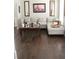 Comfortable living room with a large sectional sofa, wood floors, and tasteful decor at 3152 Spruce Way, Atlanta, GA 30349