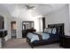 This spacious main bedroom features a beautiful tray ceiling and bright windows at 3152 Spruce Way, Atlanta, GA 30349