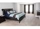 Spacious bedroom with neutral walls, large bed, and windows, offering a bright and airy feel at 3152 Spruce Way, Atlanta, GA 30349