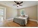 Bedroom with hardwood floors, natural light, and neutral paint at 785 Alice St, Forest Park, GA 30297