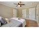 Cozy bedroom with hardwood floors, ceiling fan, and neutral-toned walls at 785 Alice St, Forest Park, GA 30297