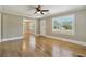 Inviting living room showcasing hardwood floors, neutral walls, natural light, and an open layout at 785 Alice St, Forest Park, GA 30297