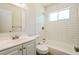 Updated bathroom showcasing a shower-tub combo with subway tile at 1237 Gale Dr, Norcross, GA 30093
