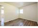Bright bedroom featuring wood-look floors and neutral walls at 1237 Gale Dr, Norcross, GA 30093