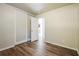 Bedroom with wood-look floors, closet, and door at 1237 Gale Dr, Norcross, GA 30093