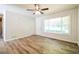 Bright living room boasts wood-look floors, neutral walls and ample natural light at 1237 Gale Dr, Norcross, GA 30093
