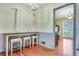Eat-in breakfast nook with wood floors and seating at table at 1351 Stephens Sw St, Lilburn, GA 30047