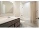 Bathroom featuring a shower-tub combination, white tiled walls, and modern fixtures at 2127 Harmony Dr, Canton, GA 30115