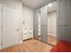 Spacious walk-in closet with full-length mirrors, built-in storage solutions, and organized layout at 2127 Harmony Dr, Canton, GA 30115