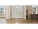 Bright and airy foyer with hardwood floors and an elegant front door at 2127 Harmony Dr, Canton, GA 30115