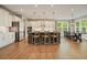 Open kitchen with a large island, pendant lights, modern appliances, and a seamless flow to the dining area at 2127 Harmony Dr, Canton, GA 30115