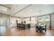Spacious kitchen with an island, bar stools, stainless steel appliances, and an adjacent dining area at 2127 Harmony Dr, Canton, GA 30115