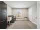 Spacious laundry room with washer and dryer, utility sink, and ample storage space at 2127 Harmony Dr, Canton, GA 30115