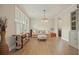Comfortable living room featuring light-colored hardwood floors and neutral decor at 2127 Harmony Dr, Canton, GA 30115
