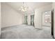 Spacious bedroom with vaulted ceiling, neutral carpet and two large windows with curtains at 4805 Wilkie Nw Way, Acworth, GA 30102